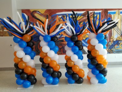Balloon columns with wacky toppers